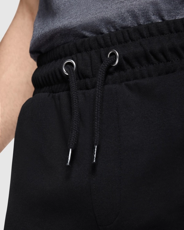 Immagine Pantaloncini sportivi BETIS Roly | 63% cot /37% pol | 270 g/m² personalizzati con stampa o ricamo.