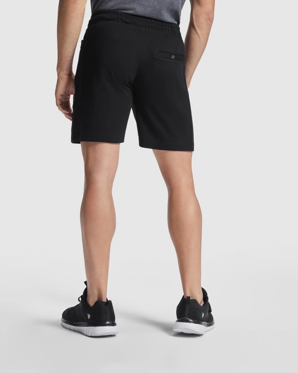 Immagine Pantaloncini sportivi BETIS Roly | 63% cot /37% pol | 270 g/m² personalizzati con stampa o ricamo.